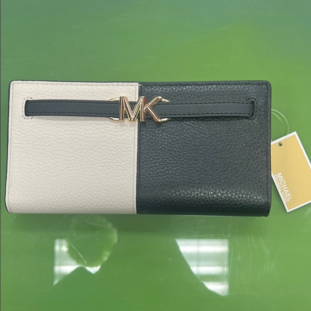 Michael Kors Black and Cream Wallet with Textured Leather and Gold Accents